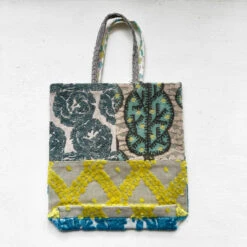 MinäPerhonen Toast Bags -loop knitting store Mina Toast bag turquoise and yellow back at Loop London