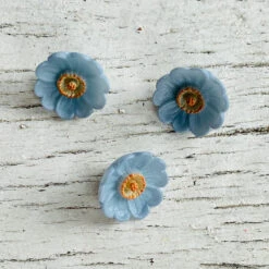 Retro Flower Button -loop knitting store RetroFlowerlightblueButtonsatLoopLondon